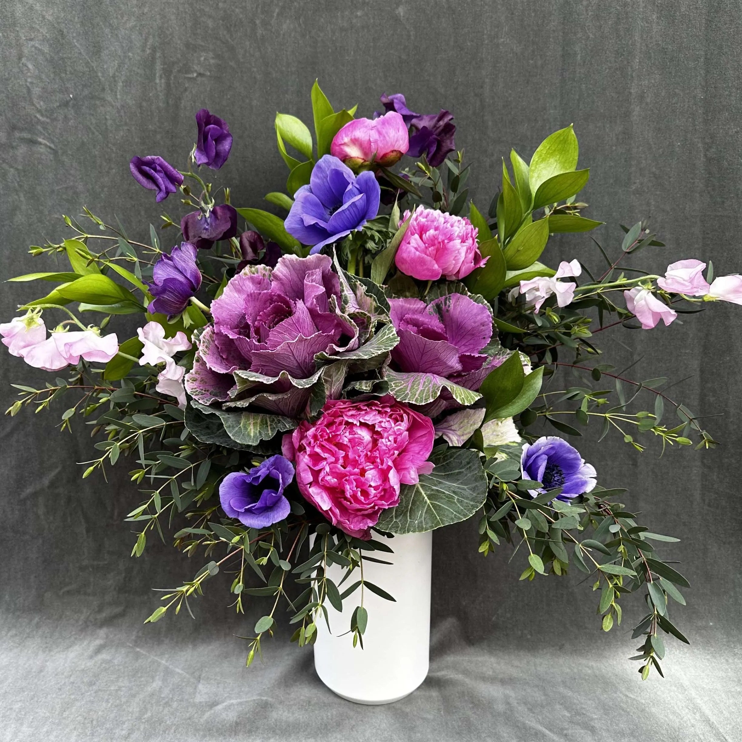 flower delivery purple kale anemones peonies