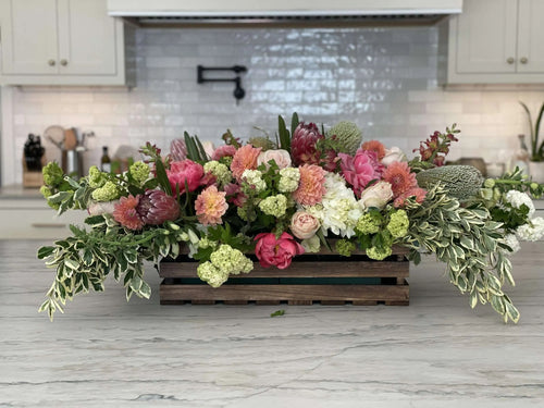 flower delivery trough centerpiece in kitchen